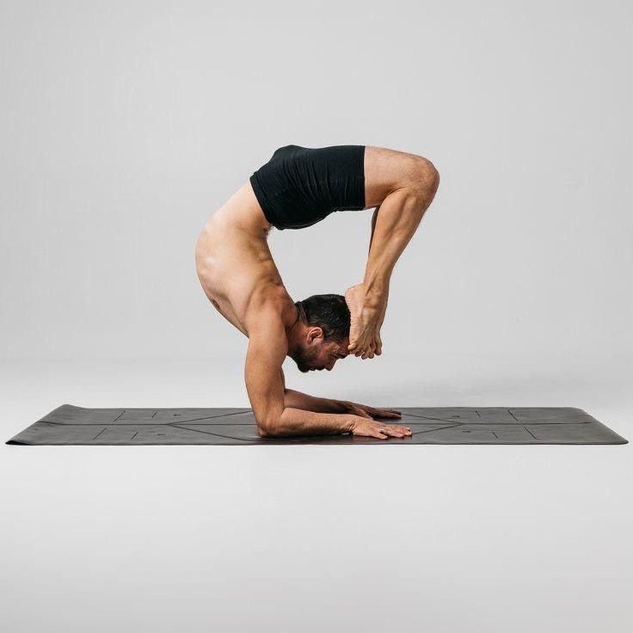 Advanced strength and flexibility yoga pose